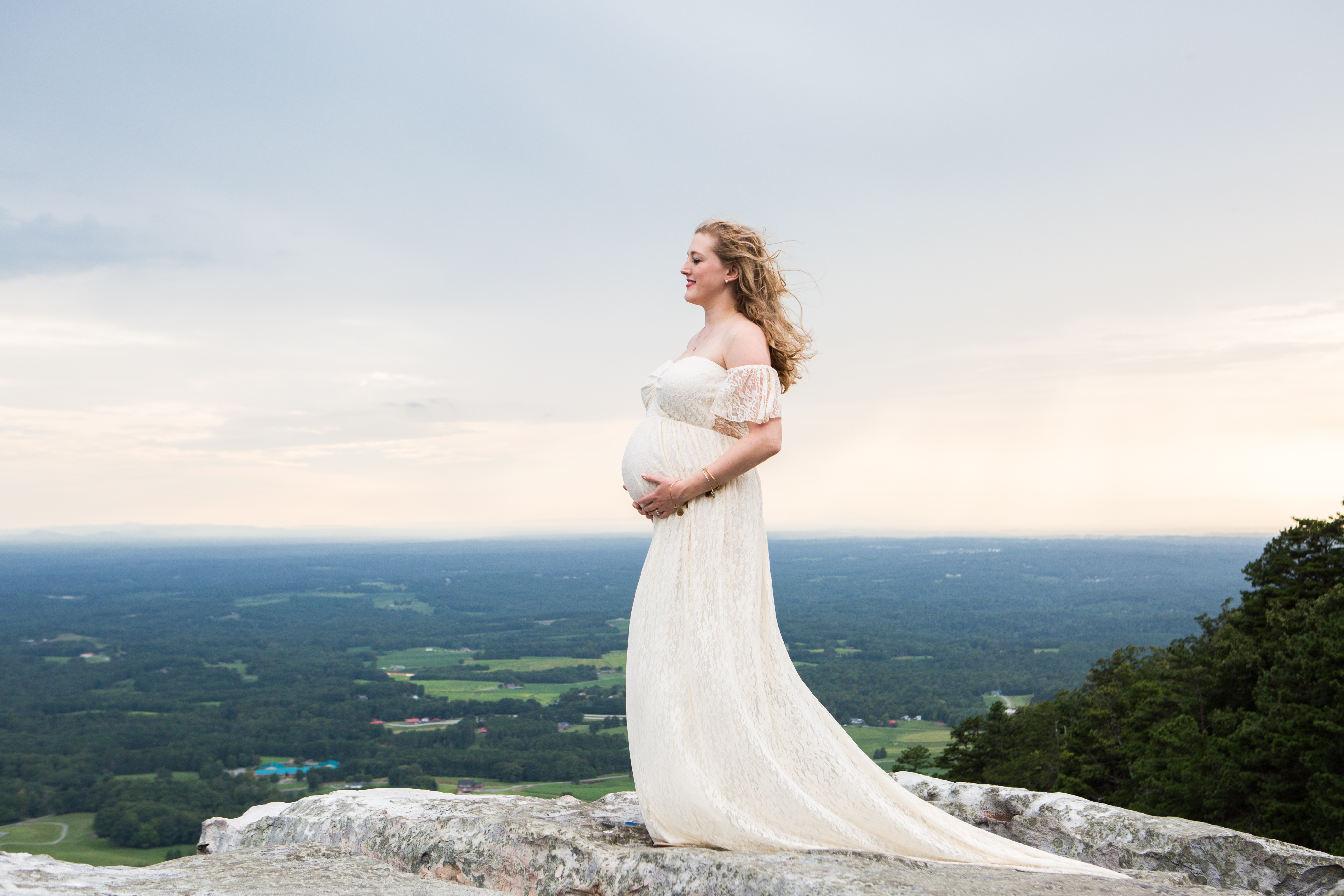 pregnant mother cream maternity dress pilot mountain posing ledge